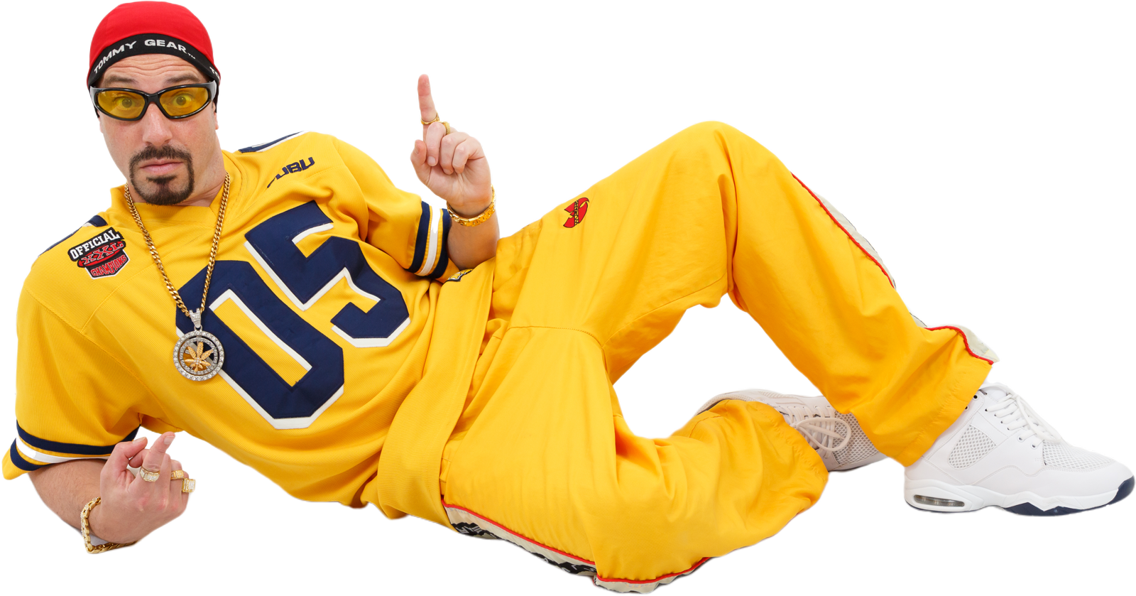 Dani B as Ali G lying down pointing up